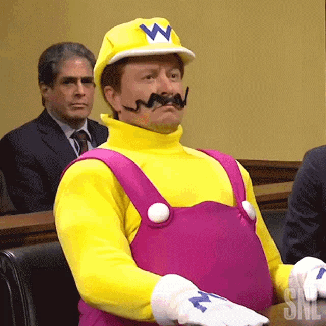 Trelonaire Musk mascot — Wario at the hearing